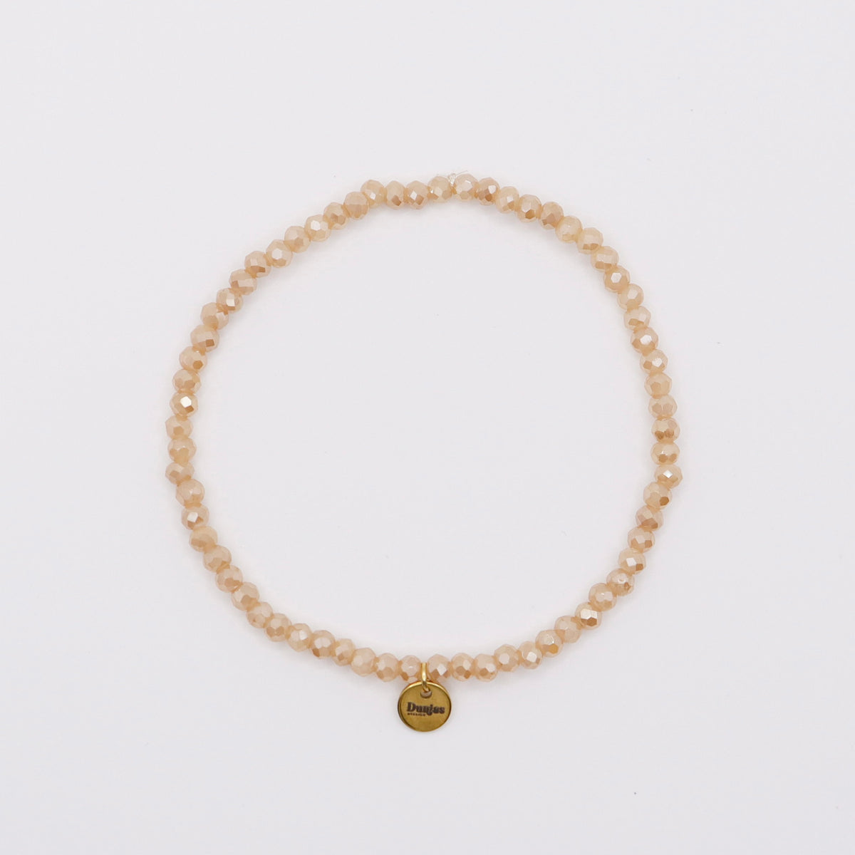 Handgefertigtes elastisches Armband mit beige-orangen Glasperlen, 17 cm, wasserfest – Dunjas Atelier Zürich