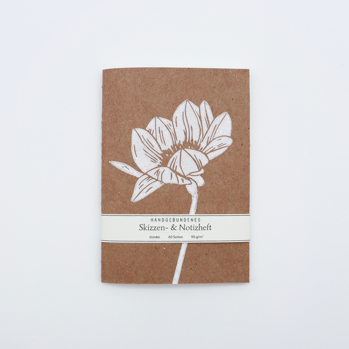 Handgebundenes A6-Heft mit Linoldruck-Blumenmotiv in Rosa, 60 Seiten blanko, 90 g/m²